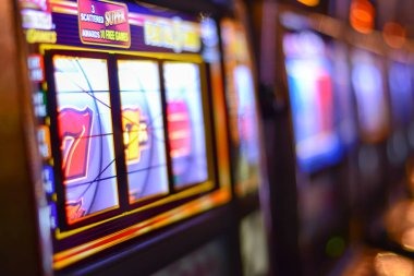 Mobile interface showing elemenbet slot game selection and tournament schedule